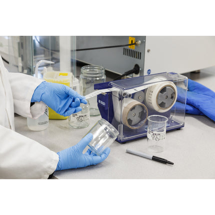 Continuous Material Dispenser with Liner Remover